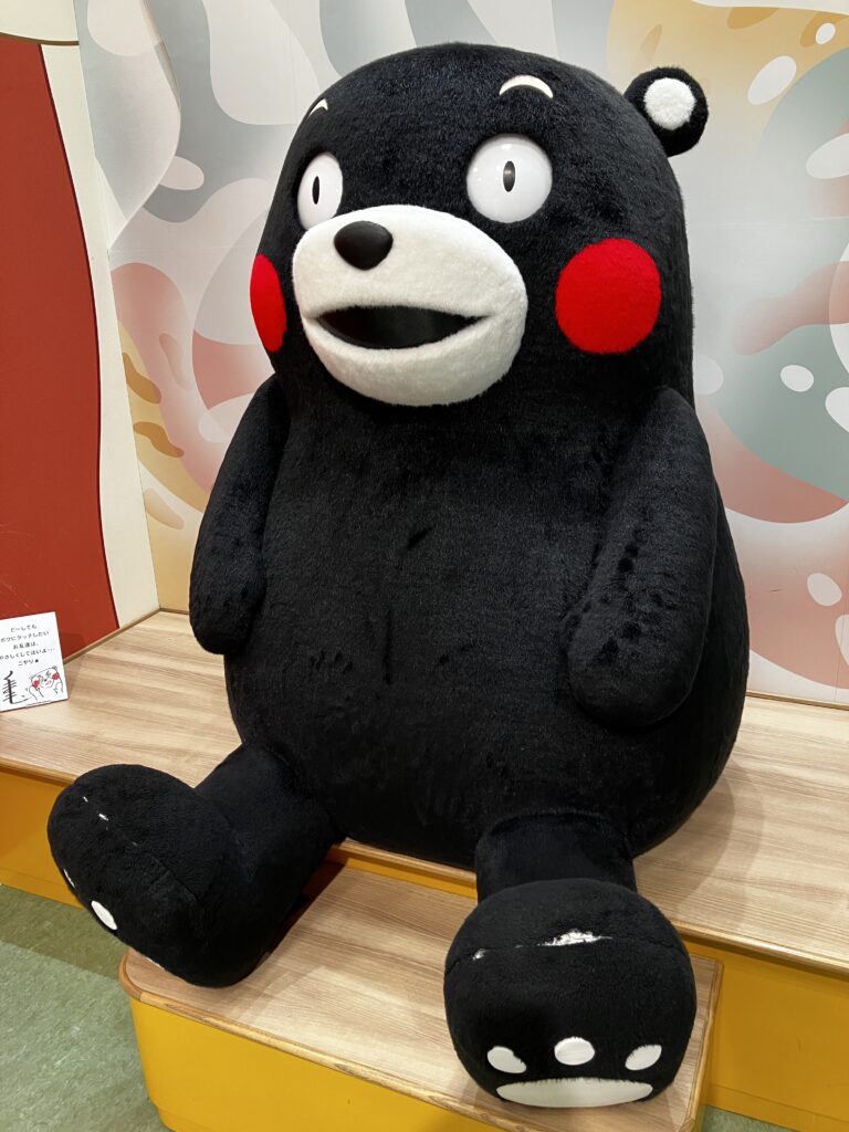 Life-sized Kumamon stuffed toy at Kumamon Square