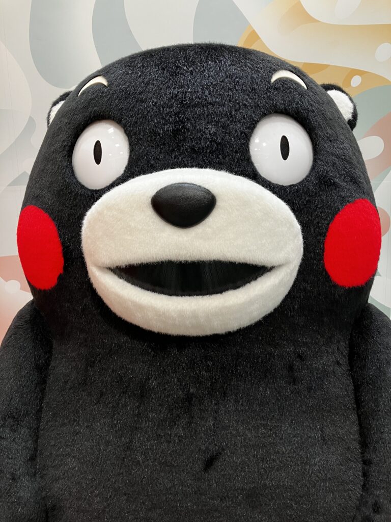 Life-sized Kumamon stuffed toy at Kumamon Square